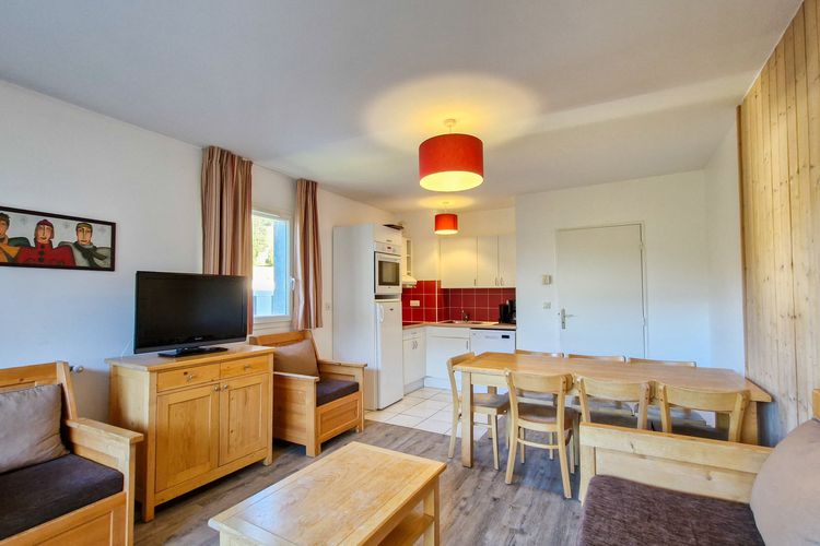 Appartement spacieux · Centre station · Balcon · Parking couvert