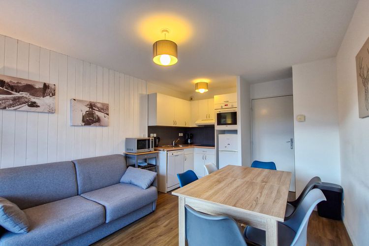 Appartement rénové · Centre station · Balcon · Parking couvert