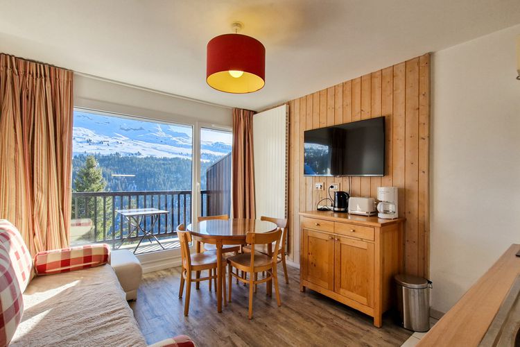 Appartement confortable · Centre station · Balcon · Parking couvert