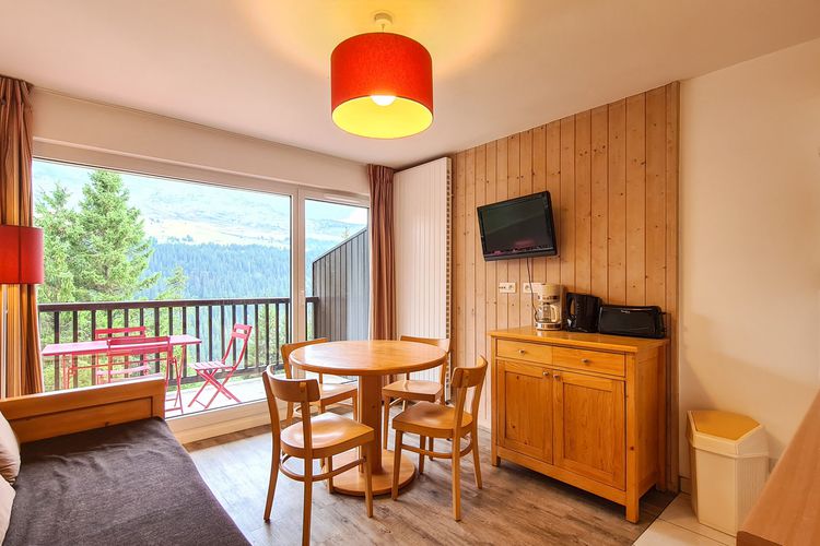 Appartement lumineux · Centre station · Parking couvert · Balcon